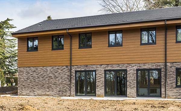 Rockpanel Woods geeft uitbreiding De Pijl warm en huiselijk karakter