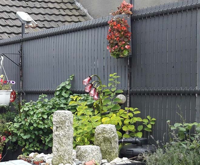 Hoe de keuze van de juiste omheining uw tuin tot een aantrekkelijke privé leefruimte transformeert