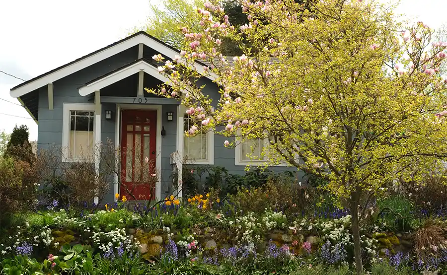 Mag je zonder vergunning een tuinhuis in je tuin plaatsen?