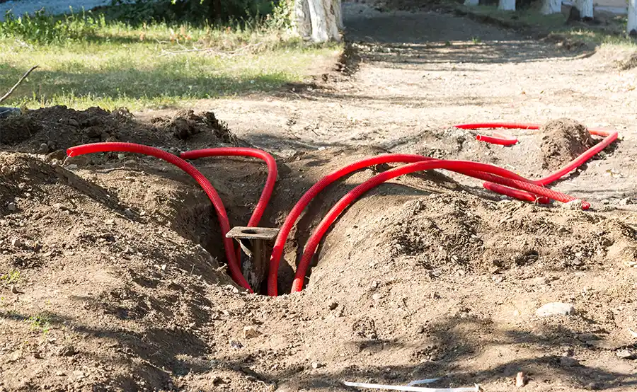 Waar moet je op letten bij het trekken van elektriciteitskabels in de tuin?