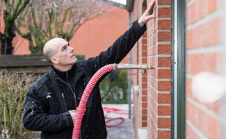 Laat uw spouwmuur na-isoleren