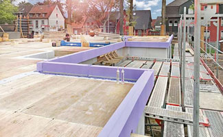 Nieuwe randbekisting voor een uitzonderlijke isolatie van betonvloeren