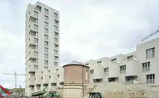 Iconische Chipperfield-toren verwelkomt eerste bewoners