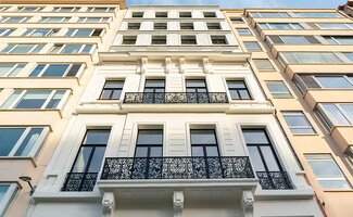 /Erfgoedtransformatie-op-de-Italielei-Academie-Verbist-wordt-luxeresidentie/