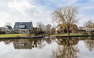 /Wonen-aan-het-water-rust-ruimte-en-realiteit/