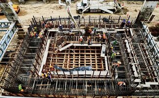 /Belgische-bouwsector-toont-voorzichtig-herstel-na-moeilijke-jaren/