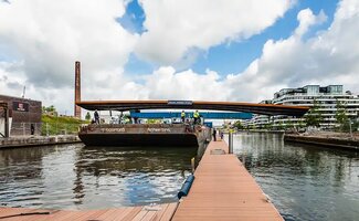/Nieuwe-belevingsbrug-verbindt-Hasseltse-kanaalkom/