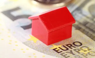 /Woningprijzen-stijgen-nog-maar-vastgoedmarkt-koelt-af/